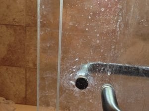 Hard water stains a on a shower door