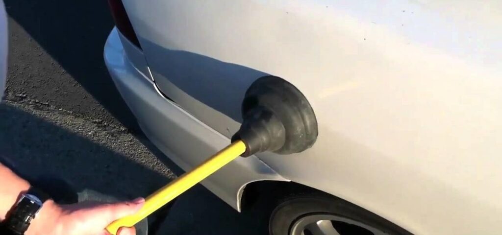 Removing a dent With a Old Household Plunger